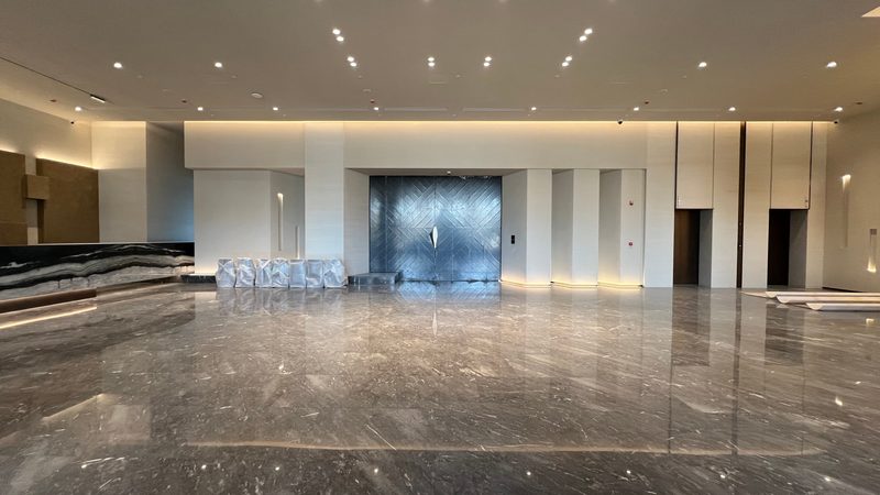 Clad piers and columns in a cast stone lobby